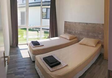 Фото номера Люкс, вид на сад Гостевой дом Karia Apartments г. Шабла 13