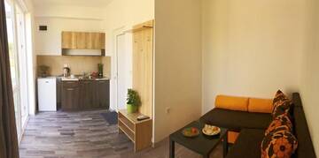 Фото номера Люкс, вид на сад Гостевой дом Karia Apartments г. Шабла 12